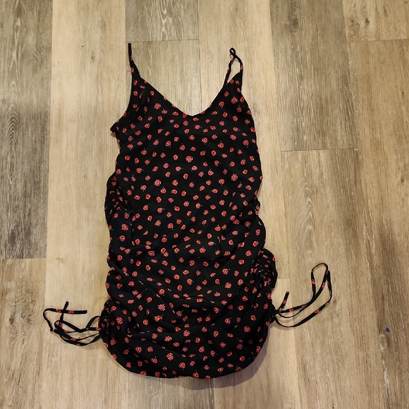 Chic Black Dress with Red Floral Pattern - Picture 1 of 8